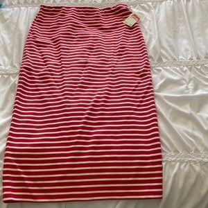 MIDI Skirt. Can dress it up  for work or even a day out with friends.